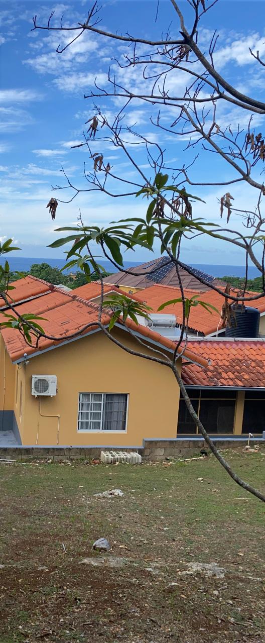 Spacious-3-Bedroom-Home-for-Sale-in-St.-Mary-Jamaica First image of Huddersfield , Lot #58 in Tower Isle, St. Mary, Jamaica - property is For Sale