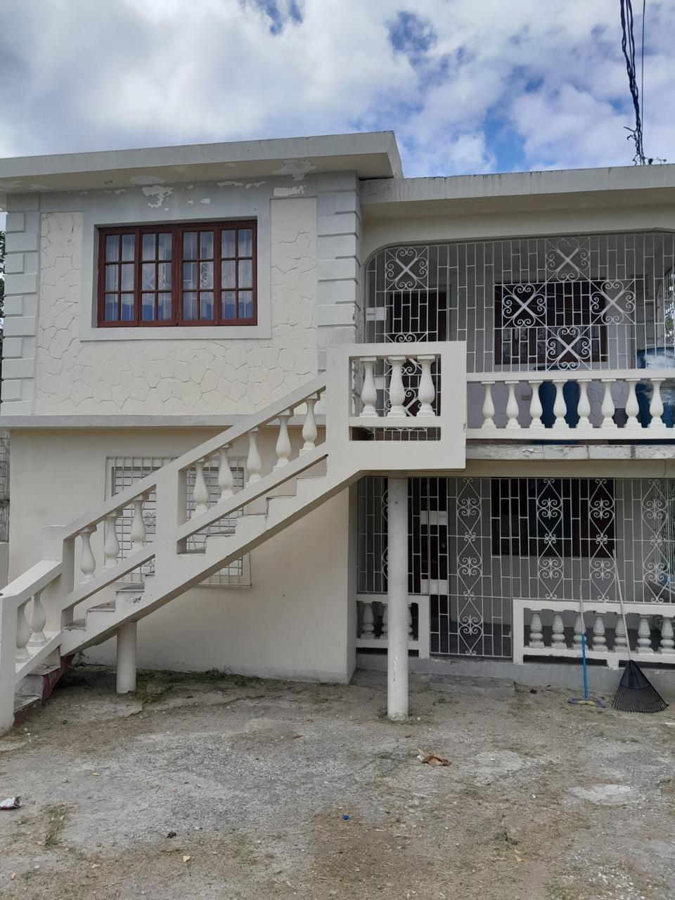 Spacious-3-Unit-Home-for-Sale-in-Norwood-Jamaica First image of Lot 106 Top Road, Norwood Pen, se in Montego Bay, St. James, Jamaica - property is For Sale
