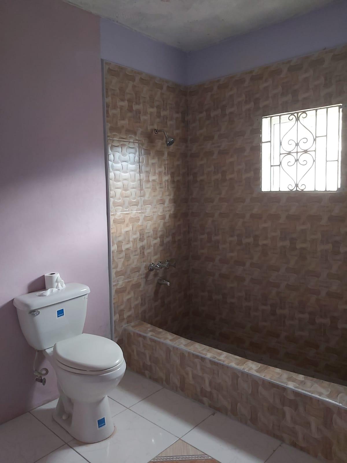 Spacious-6-Bedroom-House-for-Sale-in-Westgate-Hills-Montego-Bay Thirteenth image of 689 Westgate Blvd in Westgate Hills, St. James, Jamaica - property is For Sale