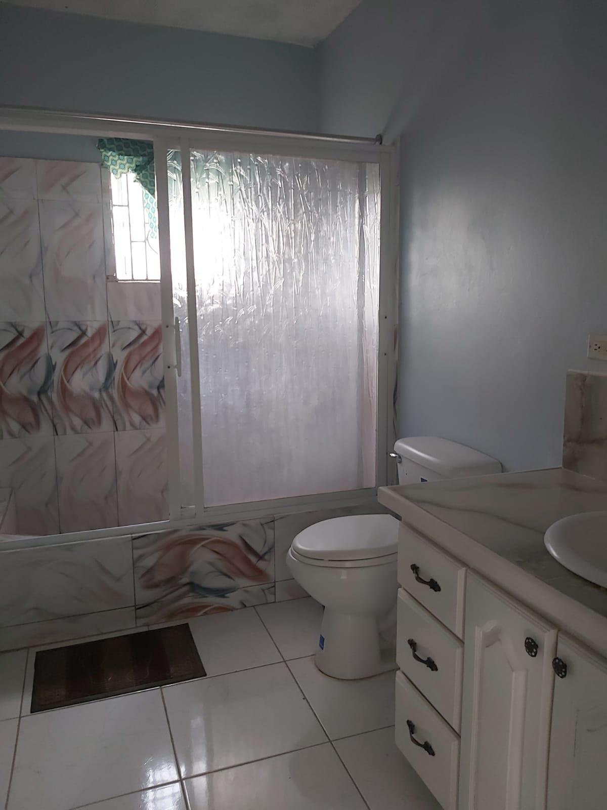 Spacious-6-Bedroom-House-for-Sale-in-Westgate-Hills-Montego-Bay Fifteenth image of 689 Westgate Blvd in Westgate Hills, St. James, Jamaica - property is For Sale