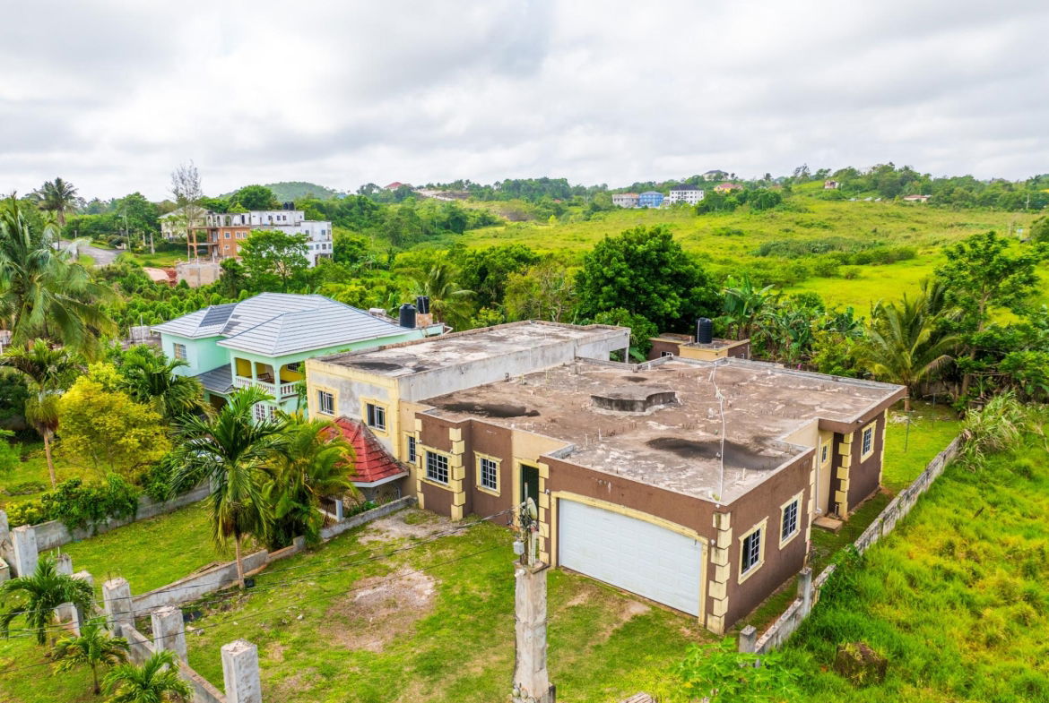 Spacious-Income-Earning-House-for-Sale-in-Mandeville-Jamaica Second image of Lot 33 College View Avenue, Mand in Cedar Grove, Manchester, Jamaica - property is For Sale