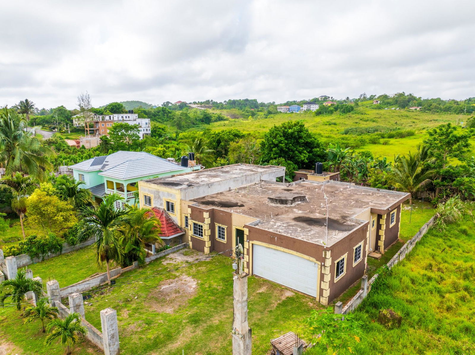 Spacious-Income-Earning-House-for-Sale-in-Mandeville-Jamaica Second image of Lot 33 College View Avenue, Mand in Cedar Grove, Manchester, Jamaica - property is For Sale