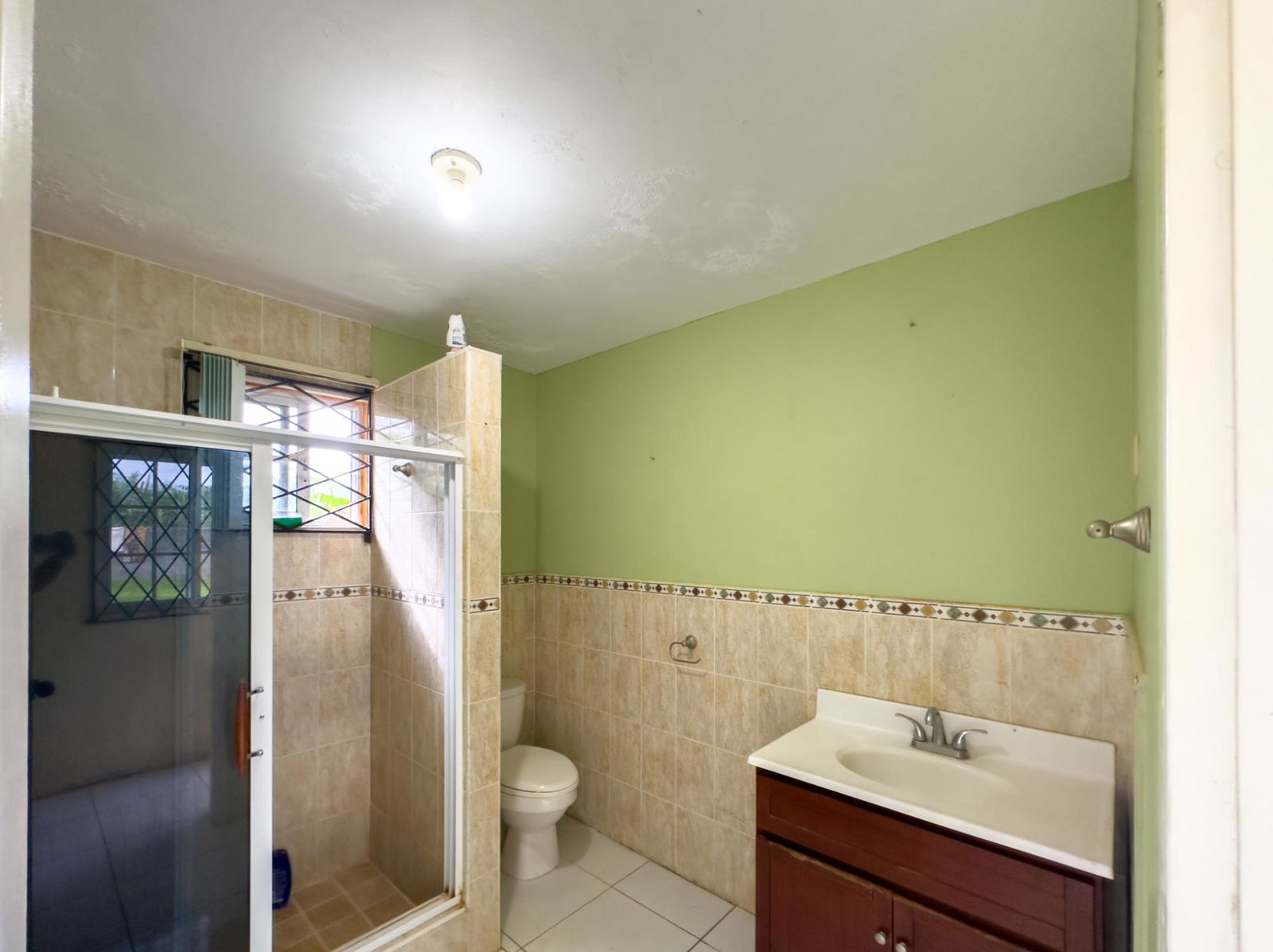 Spacious-Income-Earning-House-for-Sale-in-Mandeville-Jamaica Fourteenth image of Lot 33 College View Avenue, Mand in Cedar Grove, Manchester, Jamaica - property is For Sale