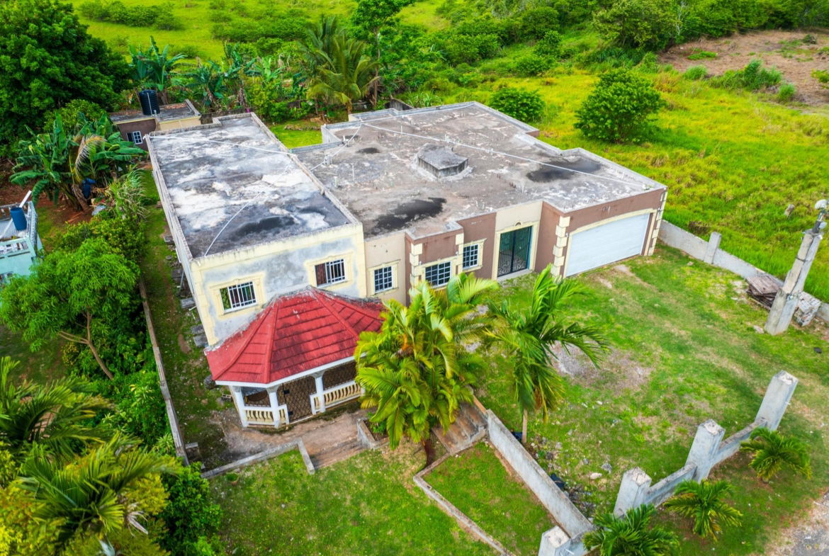Spacious-Income-Earning-House-for-Sale-in-Mandeville-Jamaica Third image of Lot 33 College View Avenue, Mand in Cedar Grove, Manchester, Jamaica - property is For Sale