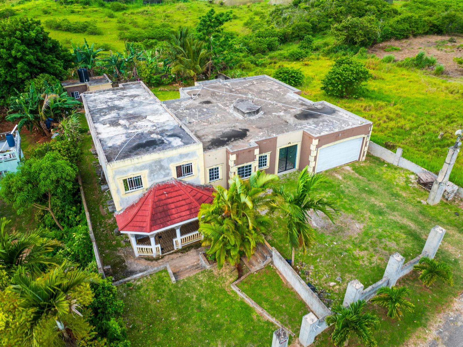 Spacious-Income-Earning-House-for-Sale-in-Mandeville-Jamaica Third image of Lot 33 College View Avenue, Mand in Cedar Grove, Manchester, Jamaica - property is For Sale