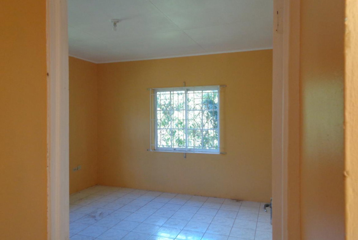 Seventh image of Pusey Close in Woodlawn Phase 2, Manchester, Jamaica - property is For Sale