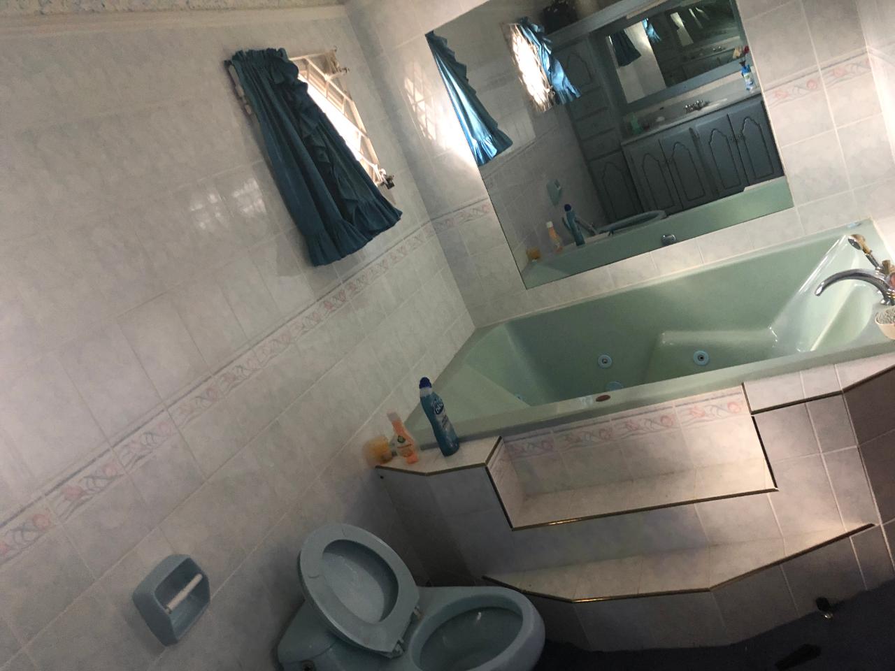 Stunning-10-Bedroom-Family-Home-for-Sale-in-Mandeville-Jamaica Twenty-Sixth image of Single-lot 2 10 West Road, Mandeville in Mandeville, Manchester, Jamaica - property is For Sale