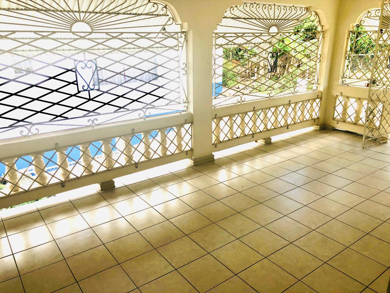 Stunning-10-Bedroom-Family-Home-for-Sale-in-Mandeville-Jamaica Twenty-Ninth image of Single-lot 2 10 West Road, Mandeville in Mandeville, Manchester, Jamaica - property is For Sale