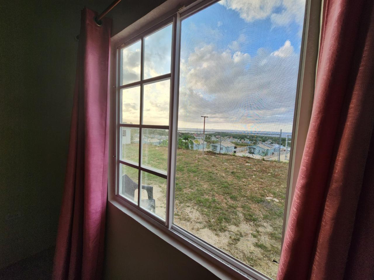 Stunning-2-Bed-Home-with-Sea-Views-in-Discovery-Bay-Jamaica Sixteenth image of 343 Camelot Blvd in Discovery Bay, St. Ann, Jamaica - property is For Rent