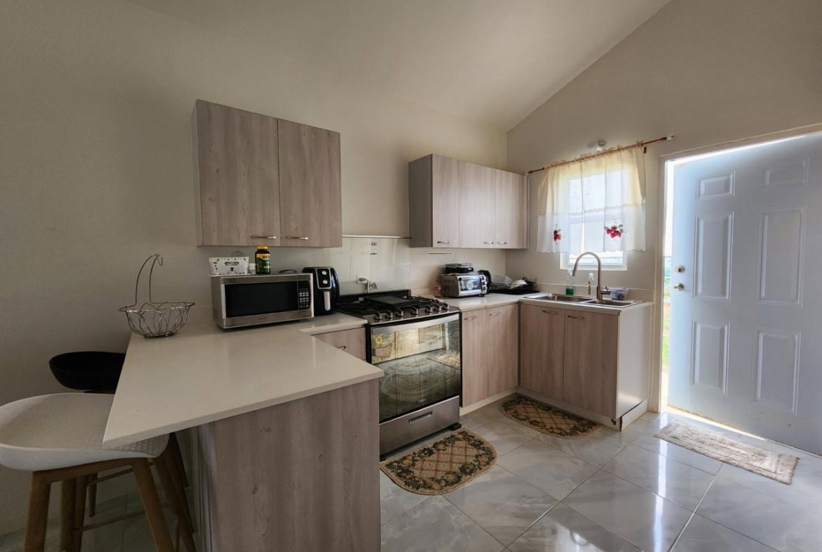 Seventh image of 343 Camelot Blvd in Discovery Bay, St. Ann, Jamaica - property is For Rent