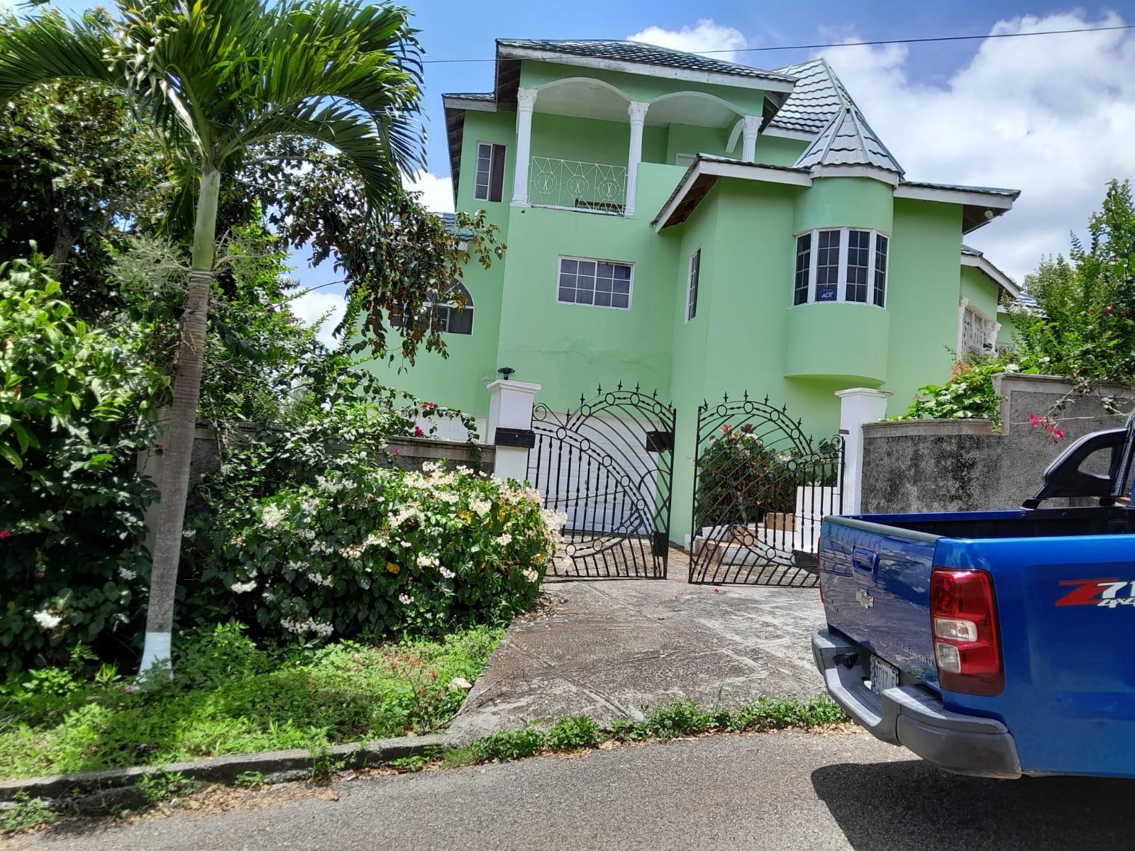 Stunning-Split-Level-Home-for-Sale-in-Mandeville-Jamaica First image of 33 Kristian Circle in Mandeville, Manchester, Jamaica - property is For Sale