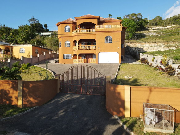 First image of 0 Kolanut Crescent in Spur Tree, Manchester, Jamaica - property is For Sale