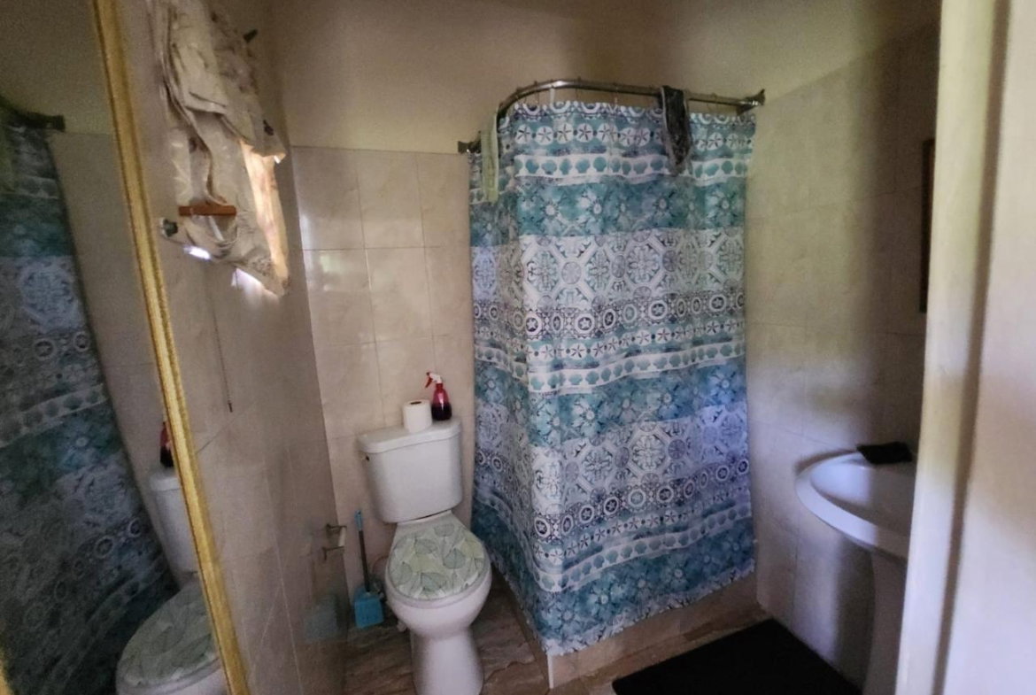 Fourteenth image of 126 Spring Farm Drive in Rose Hall, St. James, Jamaica - property is For Sale