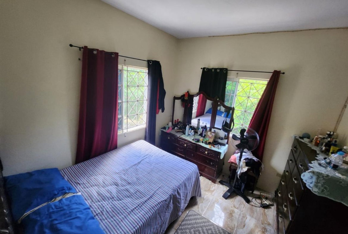 Twenty-Second image of 126 Spring Farm Drive in Rose Hall, St. James, Jamaica - property is For Sale