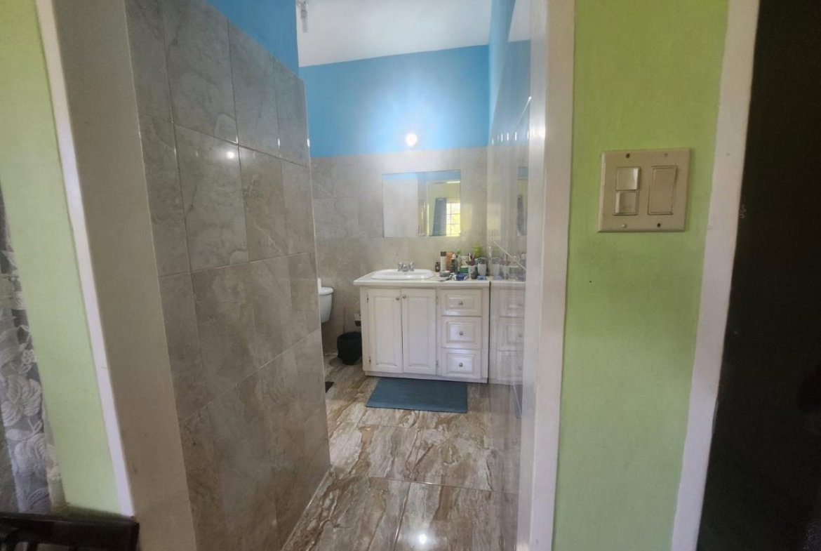 Twenty-Sixth image of 126 Spring Farm Drive in Rose Hall, St. James, Jamaica - property is For Sale