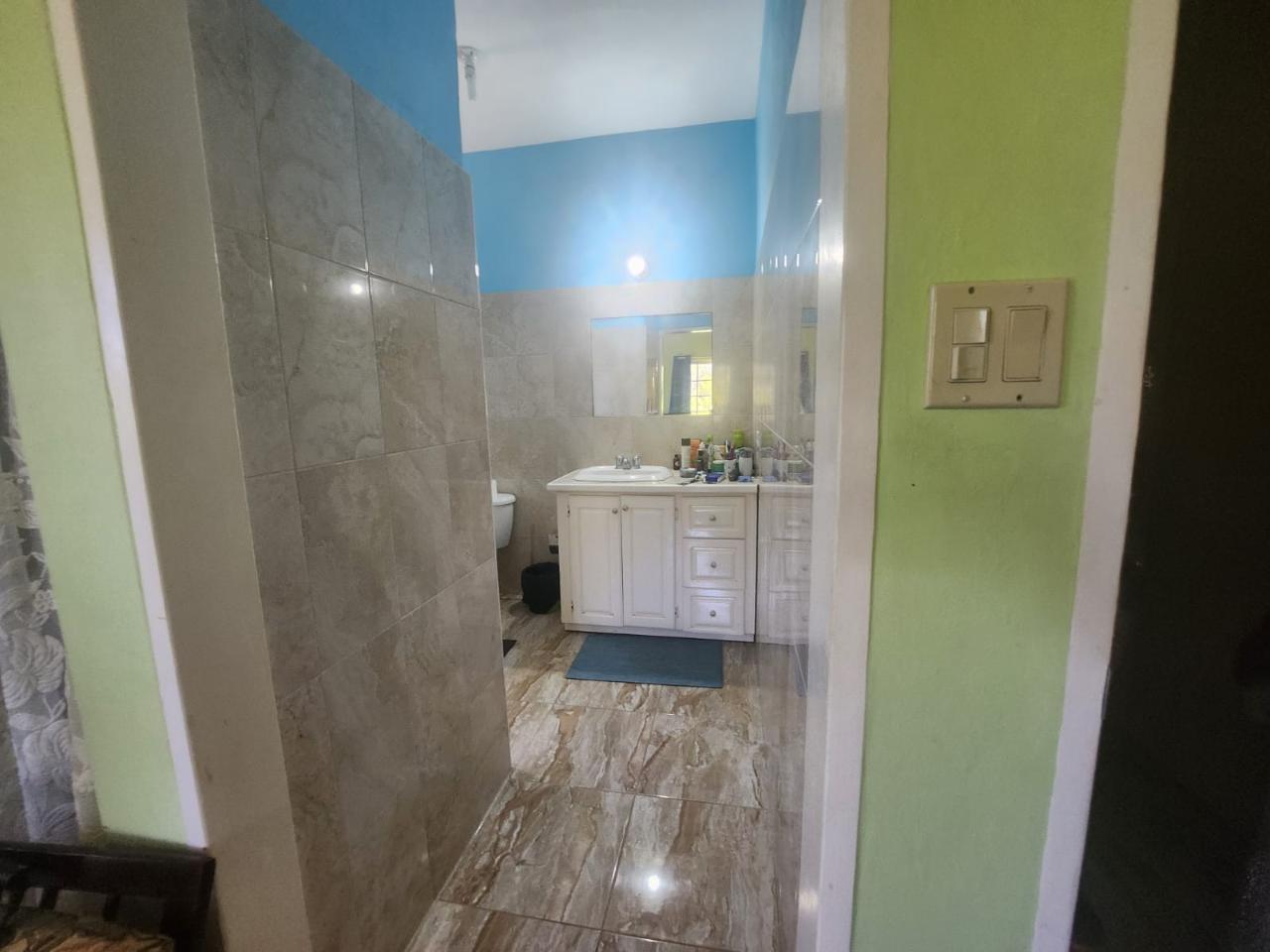 Twenty-Sixth image of 126 Spring Farm Drive in Rose Hall, St. James, Jamaica - property is For Sale