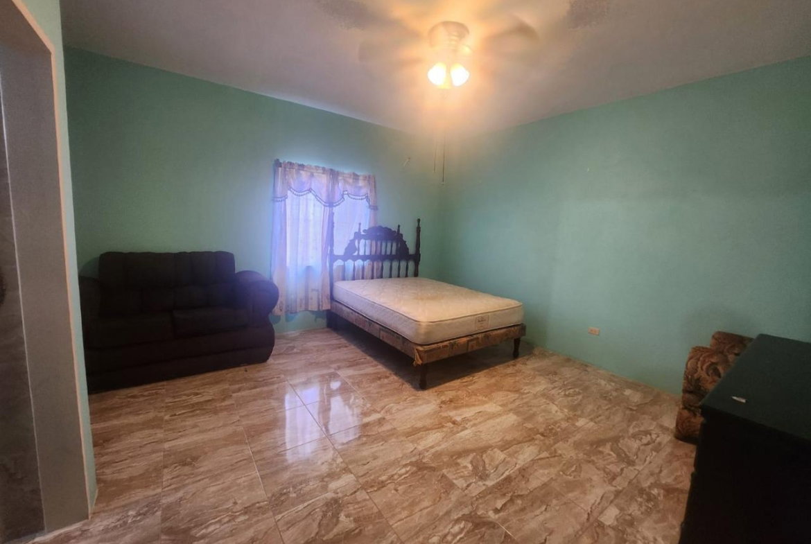 Twenty-Seventh image of 126 Spring Farm Drive in Rose Hall, St. James, Jamaica - property is For Sale