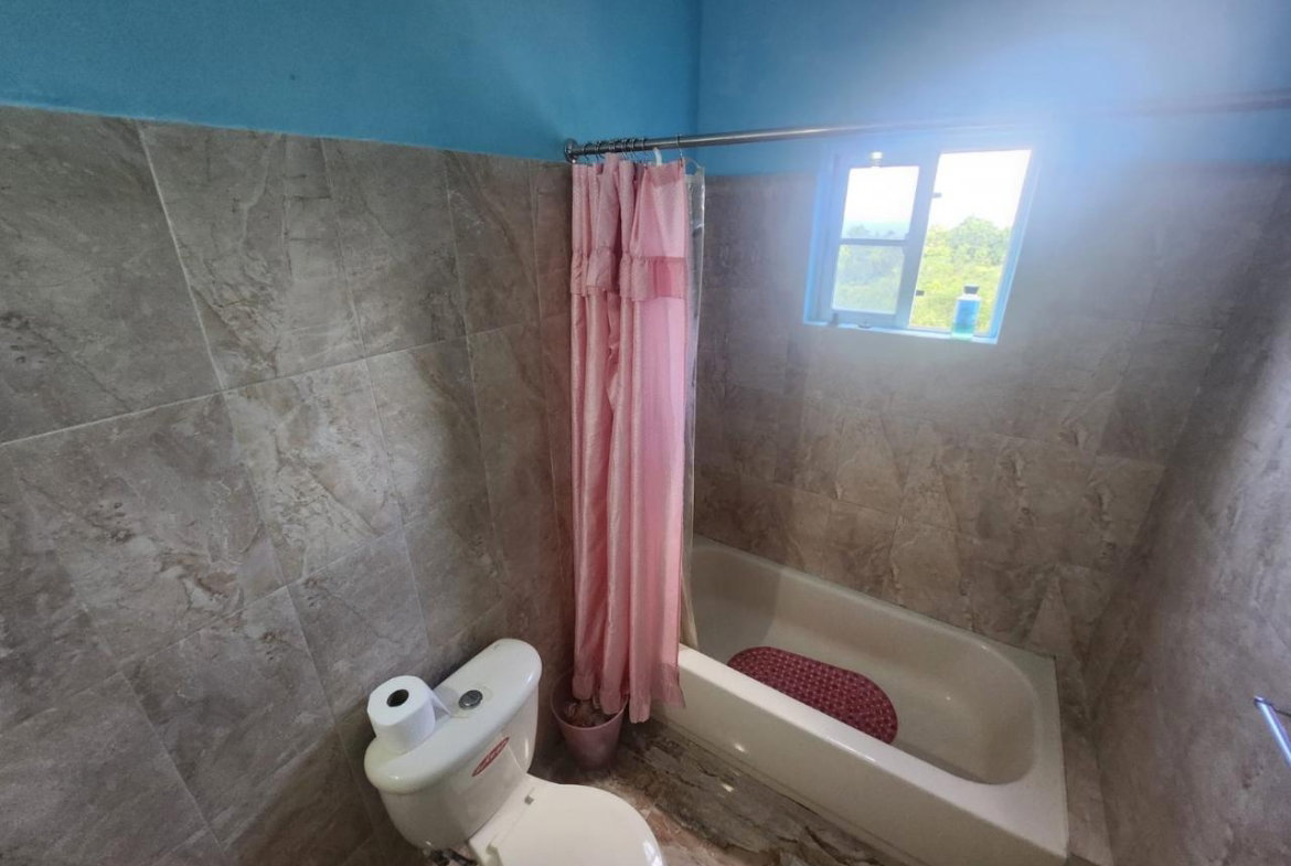 Twenty-Eighth image of 126 Spring Farm Drive in Rose Hall, St. James, Jamaica - property is For Sale