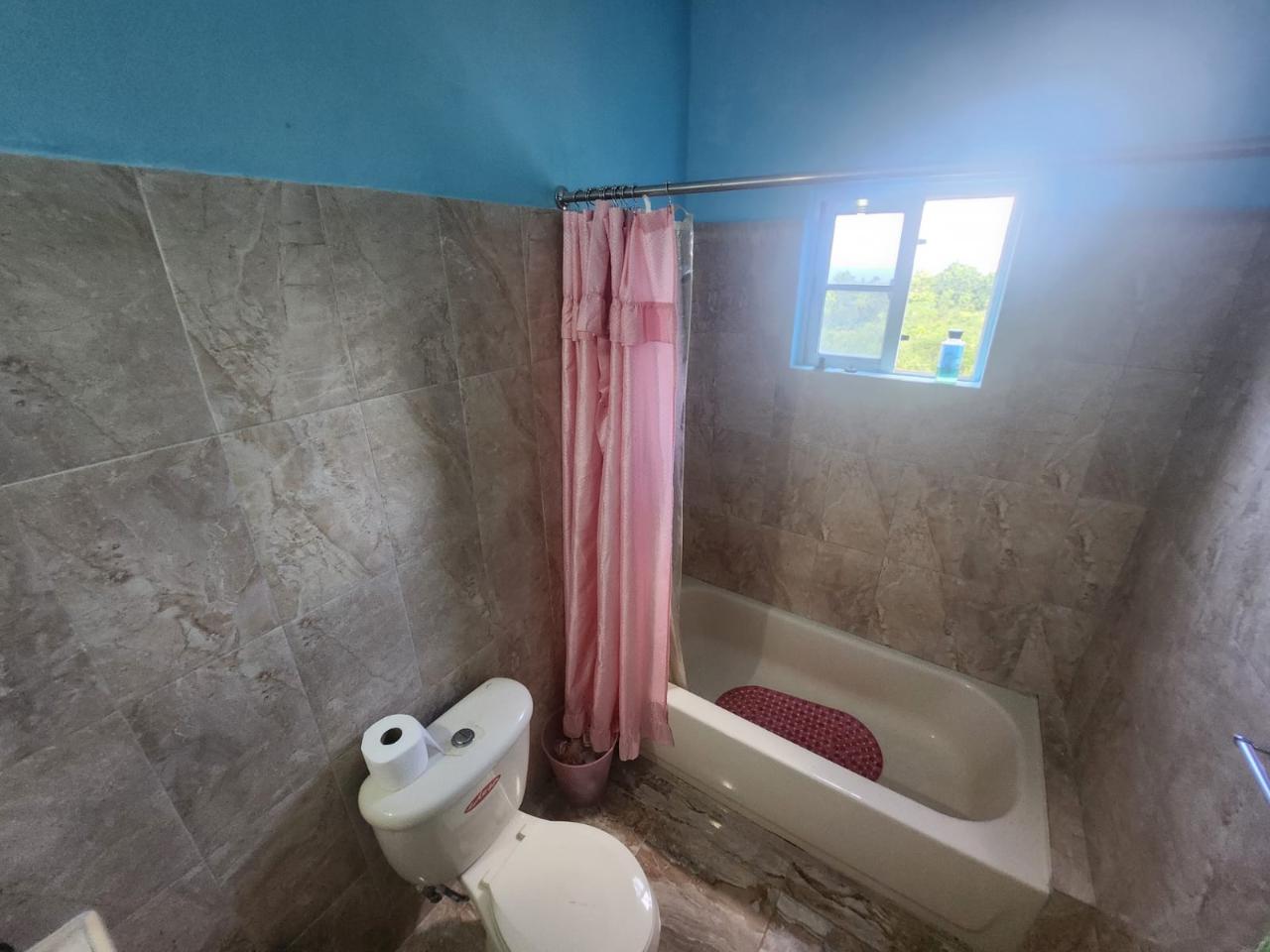 Twenty-Eighth image of 126 Spring Farm Drive in Rose Hall, St. James, Jamaica - property is For Sale