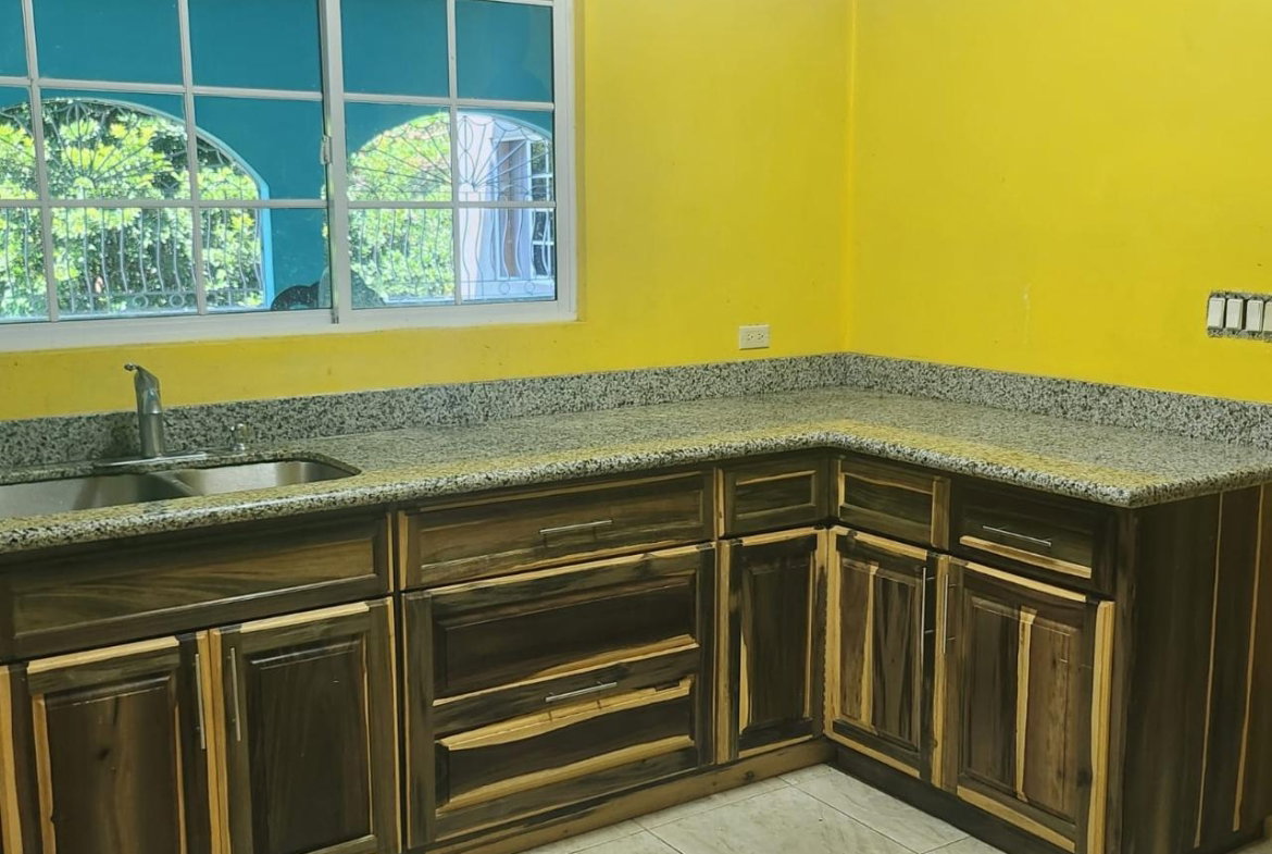 Seventh image of 126 Spring Farm Drive in Rose Hall, St. James, Jamaica - property is For Sale
