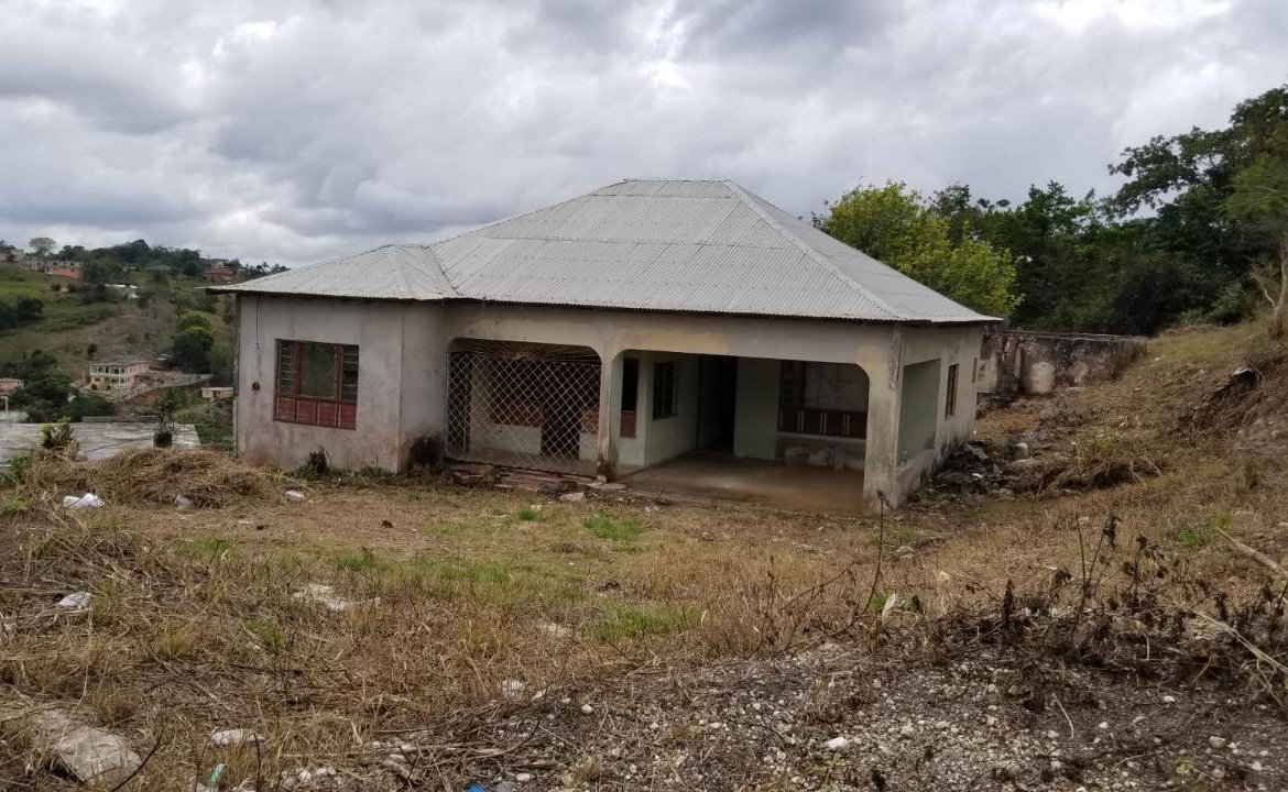 First image of 74 Chudleigh Housing Sche in Christiana, Manchester, Jamaica - property is For Sale