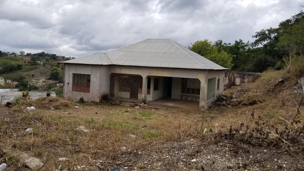 First image of 74 Chudleigh Housing Sche in Christiana, Manchester, Jamaica - property is For Sale