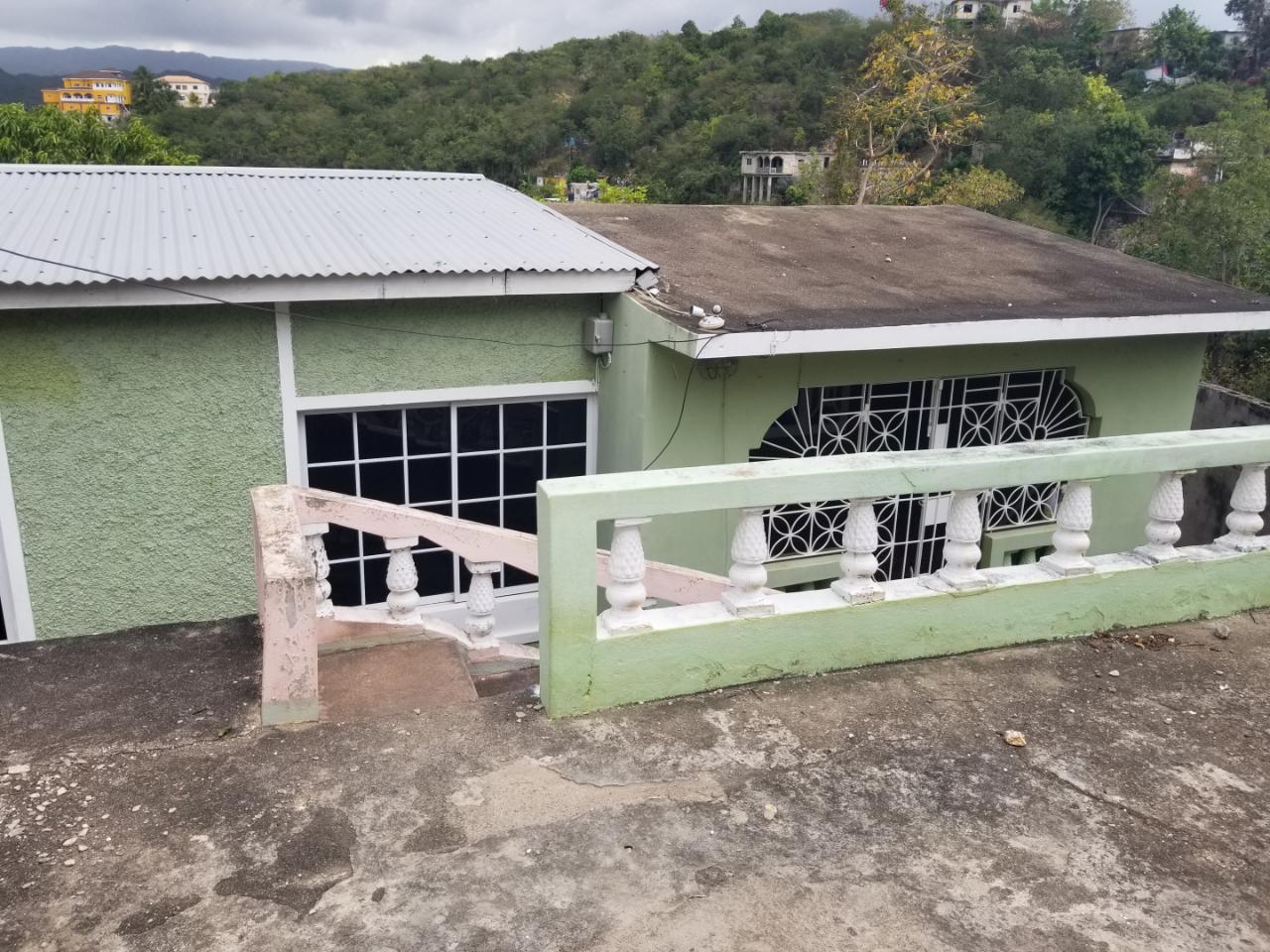 Turnkey-House-for-Sale-in-St.-Catherine-Jamaica-Tranquil-Living-at-Lot-86-Orchid-View Second image of Lot 86 Orchid View in Spanish Town, St. Catherine, Jamaica - property is For Sale