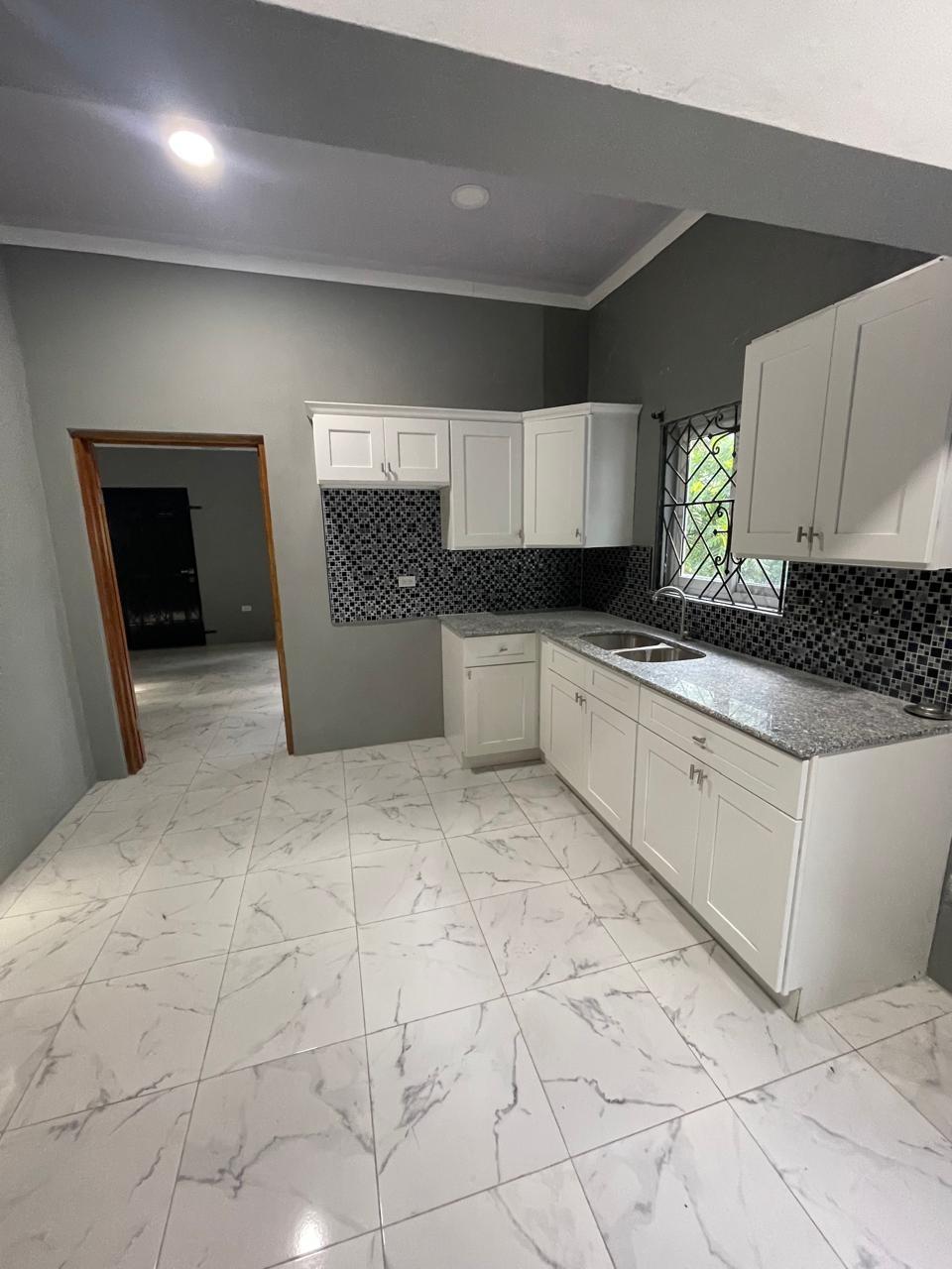 Charming-2-Bedroom-House-for-Rent-in-Belvedere-Heights-Jamaica First image of 15 Belvedere Road in Belvedere, St. Andrew, Jamaica - property is For Rent
