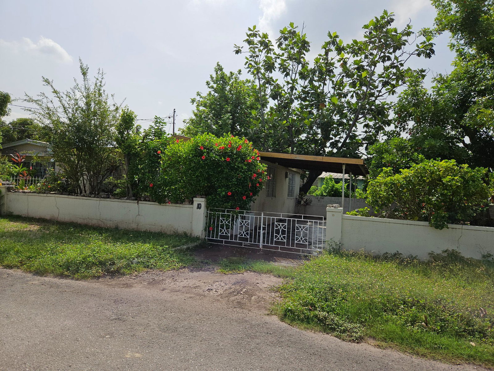 Charming-2-Bedroom-House-for-Sale-in-Kingston-Jamaica First image of 10 Flamstead Drive, Kingston in Pembroke Hall, St. Andrew, Jamaica - property is For Sale