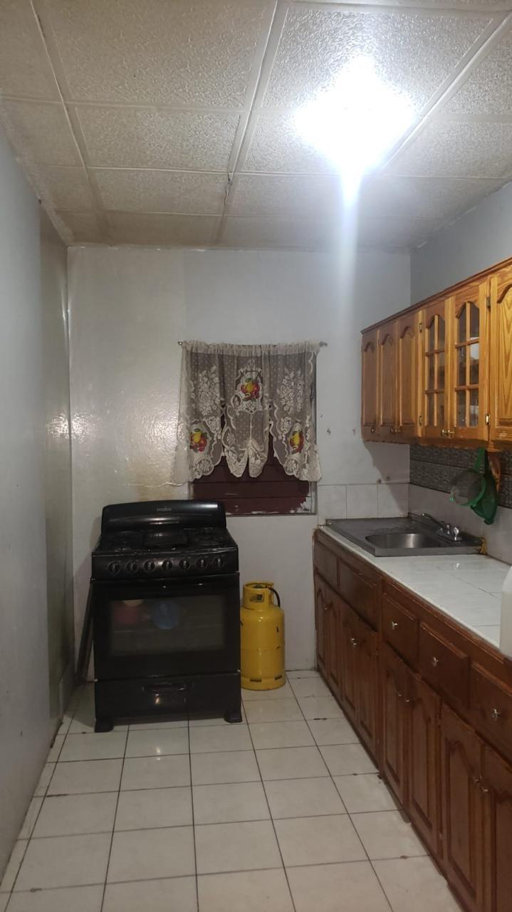 Charming-2-Family-Home-for-Sale-in-Three-Oaks-Gardens-Jamaica Second image of Champlain Avenue in Kingston 20, St. Andrew, Jamaica - property is For Sale