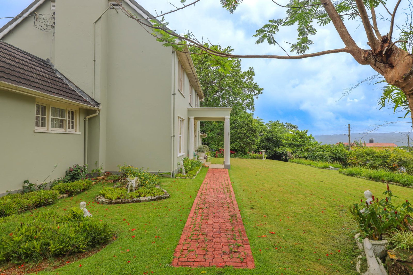 Charming-3-Bedroom-Home-with-Cottage-for-Sale-in-Ingleside-Jamaica Third image of 10 Orange Avenue, Ingleside in Mandeville, Manchester, Jamaica - property is For Sale