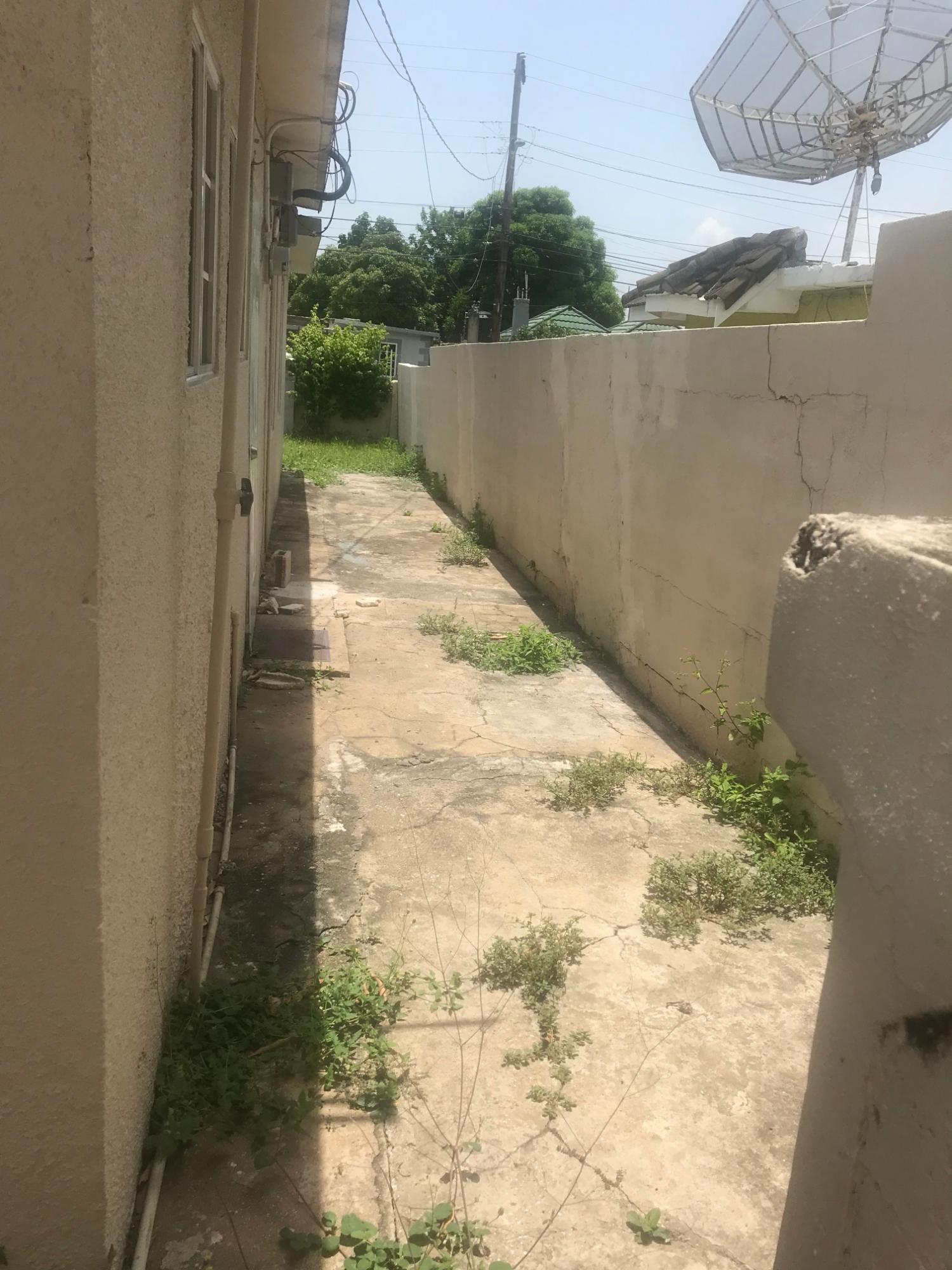 Twenty-First image of 24 Queensbury Drive, Kingsto in Kingston 19, St. Andrew, Jamaica - property is For Sale