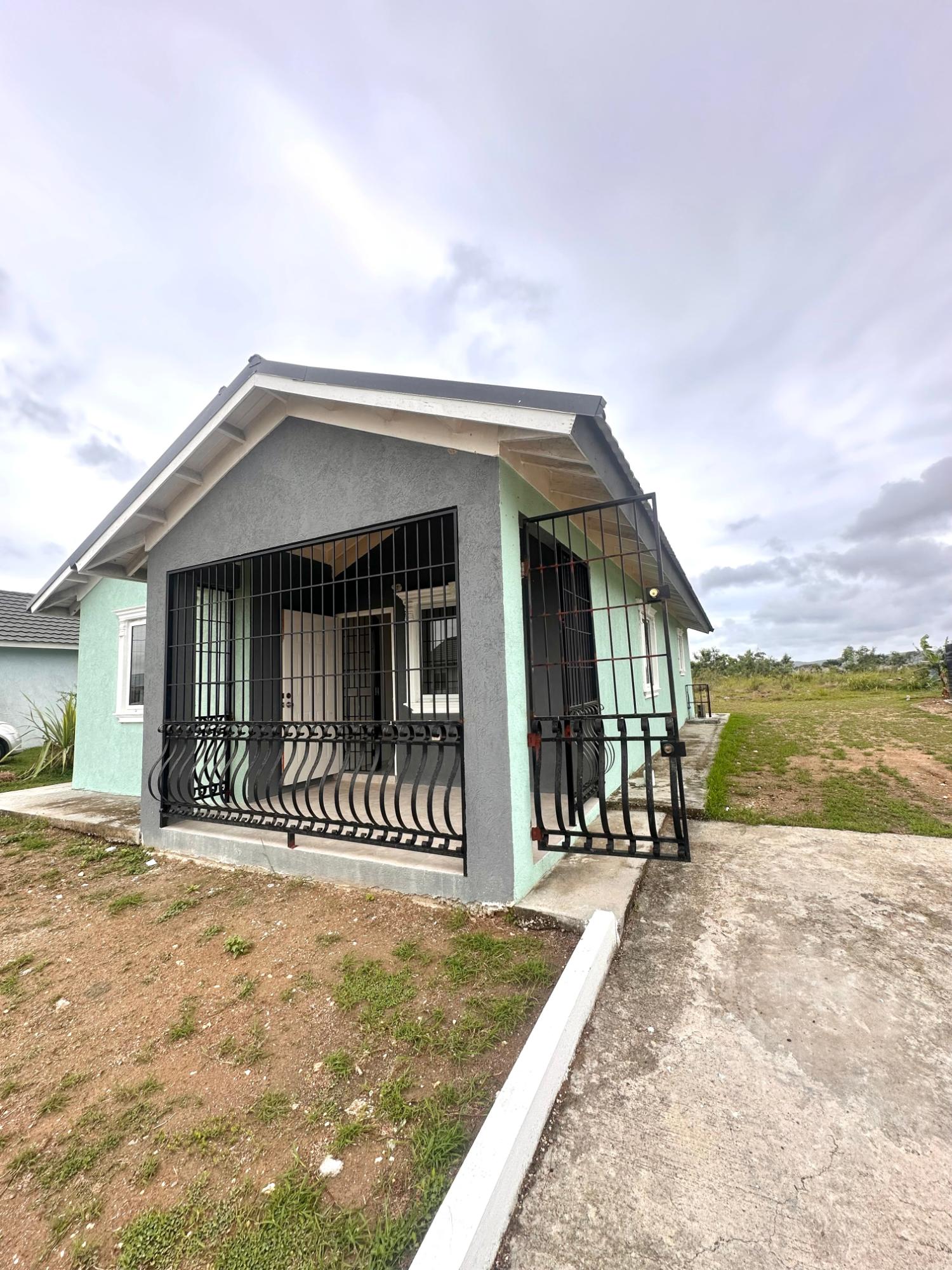 Modern-2-Bedroom-House-for-Sale-in-The-Orchards-St.-Catherine Second image of Lot 129 Ambrosia Crescent, Phase in Innswood, St. Catherine, Jamaica - property is For Sale