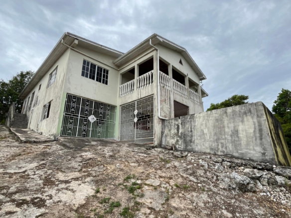 First image of 4 Woodleigh Decarteret rd in Mandeville, Manchester, Jamaica - property is For Sale