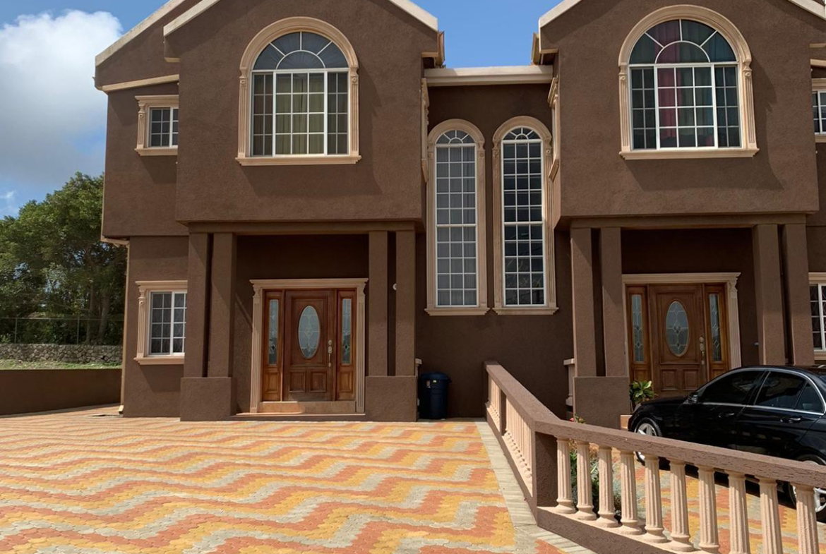 First image of Newark Subdivision in Spur Tree, Manchester, Jamaica - property is For Sale