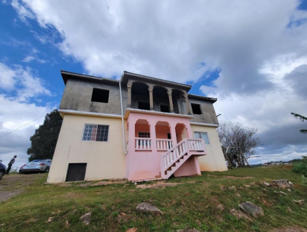 First image of 6 Williams Drive in Knockpatirck, Manchester, Jamaica - property is For Sale