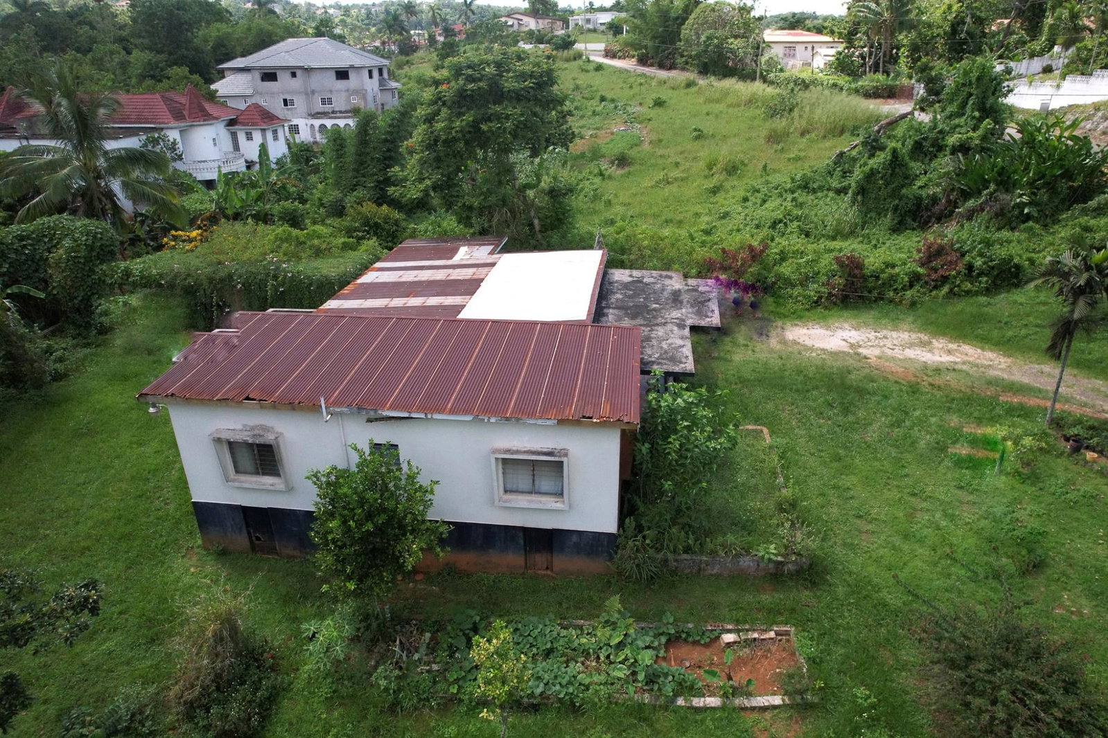 Sixth image of 66 Woodlawn, Godfrey Lands in Mandeville, Manchester, Jamaica - property is For Sale