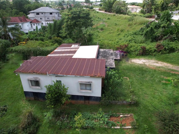 First image of 66 Woodlawn, Godfrey Lands in Mandeville, Manchester, Jamaica - property is For Sale