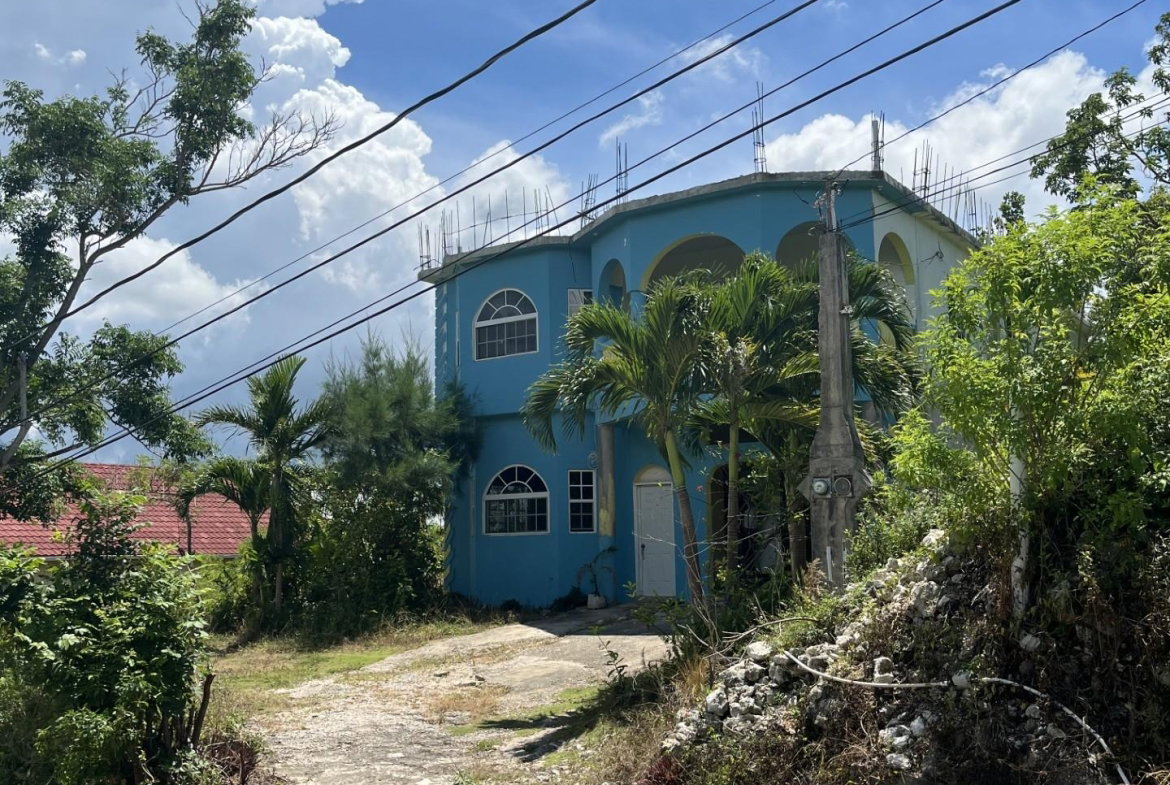 First image of 200 Orchard Close in Williamsfield, Manchester, Jamaica - property is For Sale