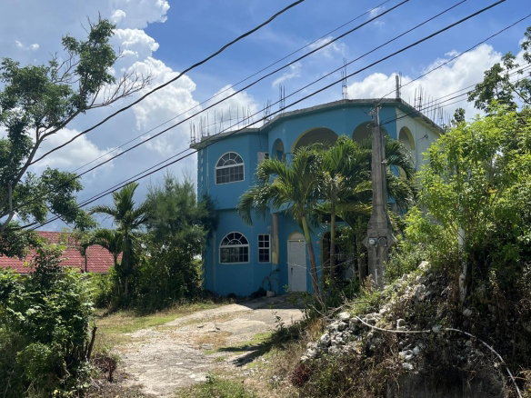 First image of 200 Orchard Close in Williamsfield, Manchester, Jamaica - property is For Sale