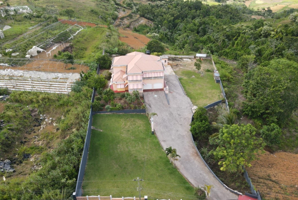 First image of Halifax, Devon, Mancheste in Devon, Manchester, Jamaica - property is For Sale