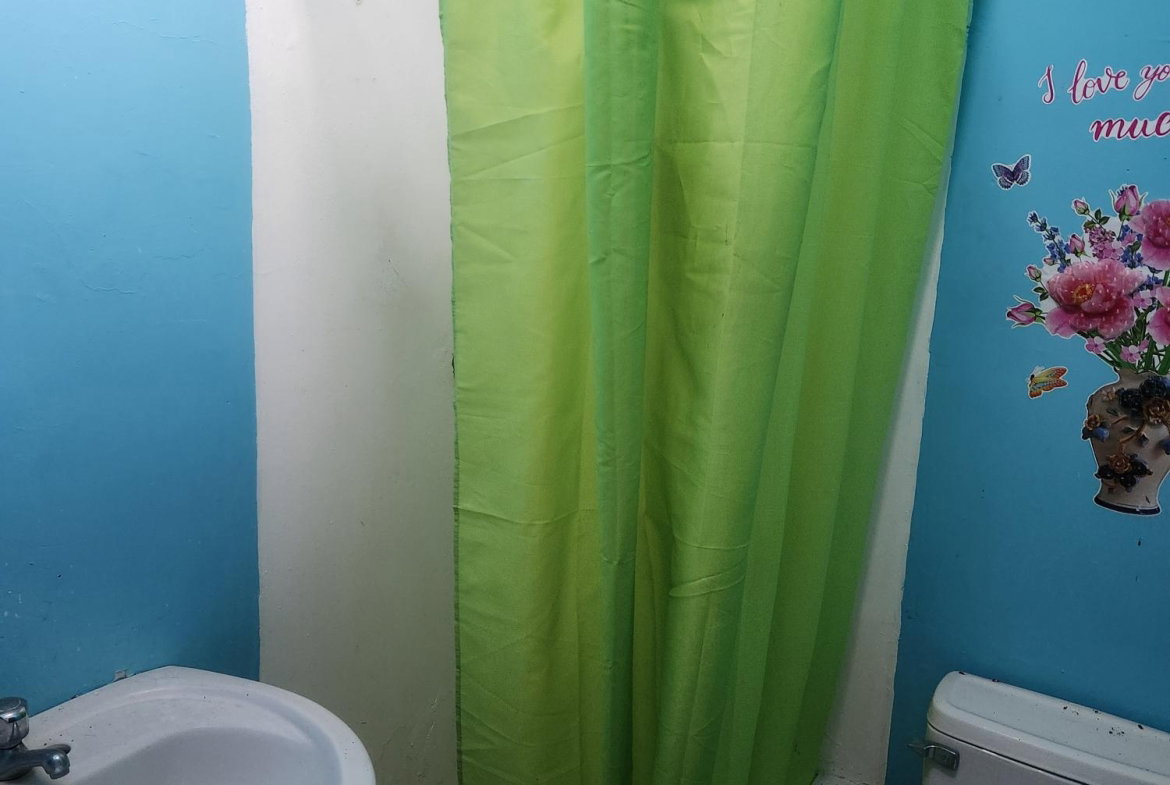 Fifth image of 54 Riverside Park, Ensom Cit in Ensom City, St. Catherine, Jamaica - property is For Sale