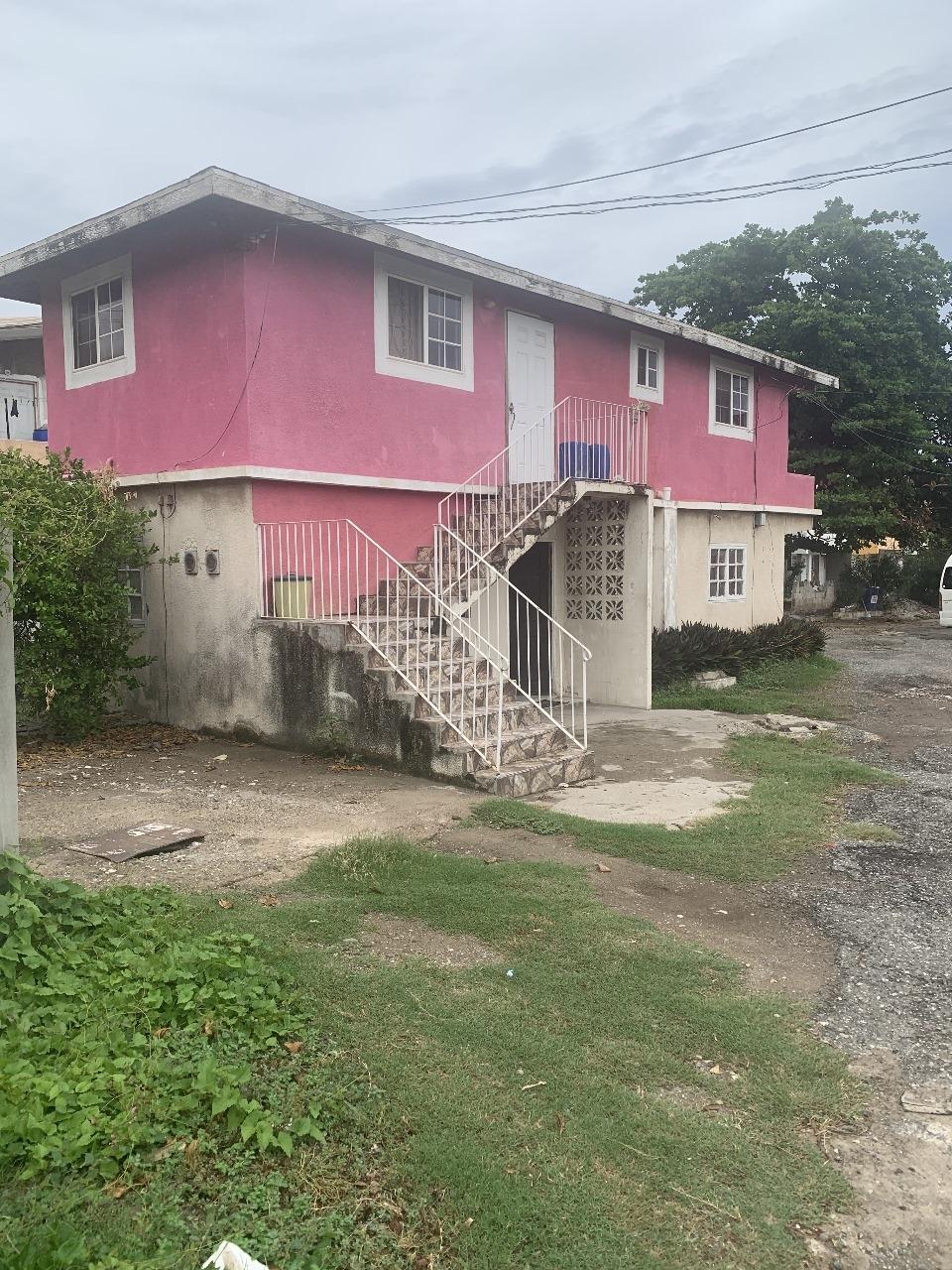 Cozy-One-Bedroom-Flat-for-Sale-in-St.-Andrew-Jamaica Third image of Lot 4- Abyssinia Court, Seven mi in BULL BAY, St. Andrew, Jamaica - property is For Sale