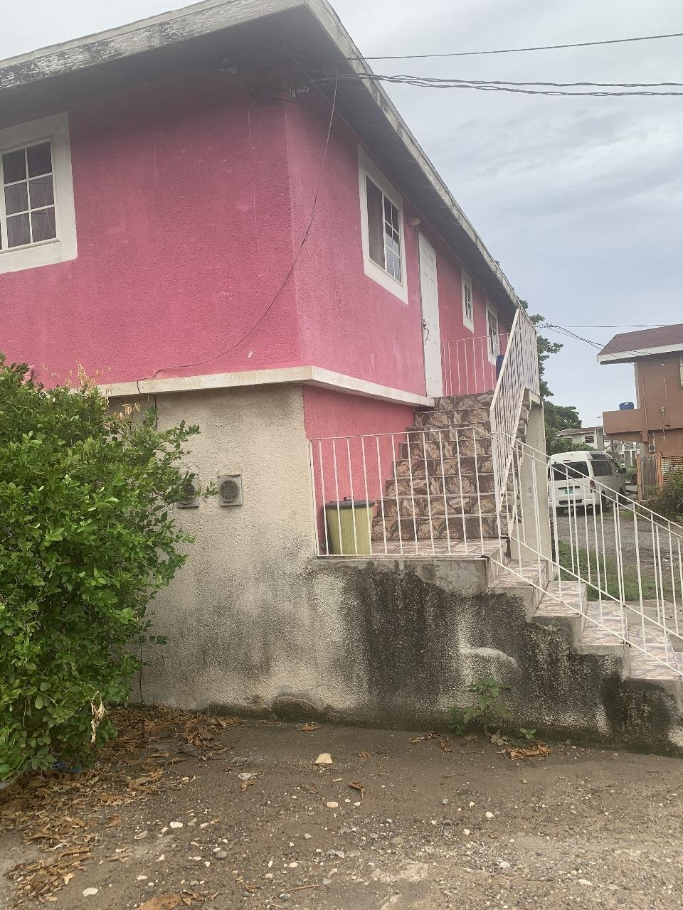 Cozy-One-Bedroom-Flat-for-Sale-in-St.-Andrew-Jamaica Seventh image of Lot 4- Abyssinia Court, Seven mi in BULL BAY, St. Andrew, Jamaica - property is For Sale