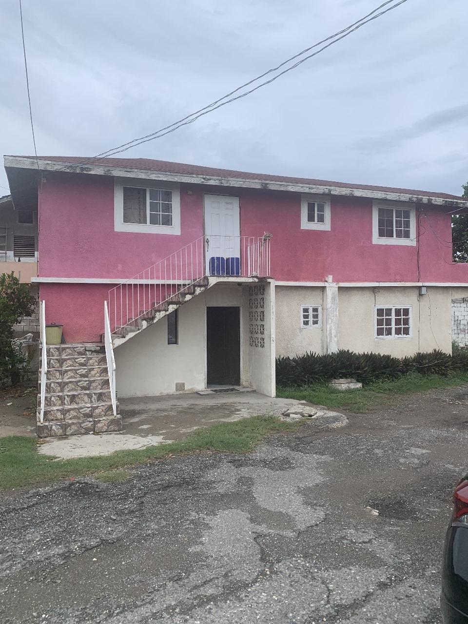 Cozy-One-Bedroom-Flat-for-Sale-in-St.-Andrew-Jamaica First image of Lot 4- Abyssinia Court, Seven mi in BULL BAY, St. Andrew, Jamaica - property is For Sale