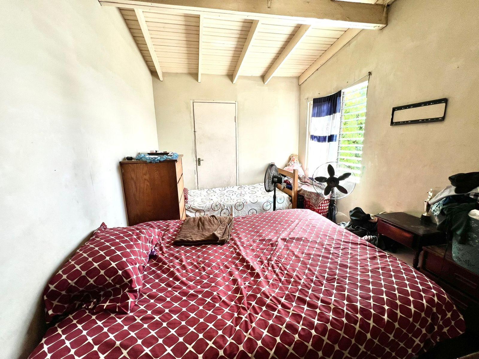Seventh image of 9-76 Molynes Road in Molynes Square, St. Andrew, Jamaica - property is For Sale