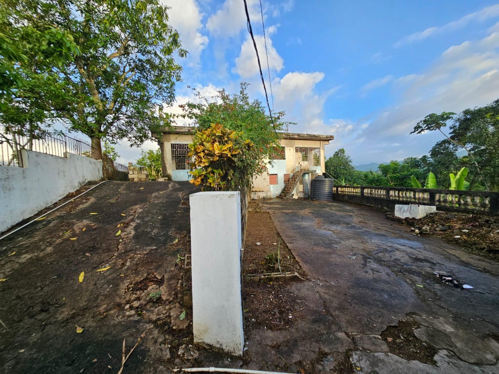 Investment-Opportunity-3-Houses-on-1-Acre-in-Lawrence-Tavern-Jamaica Eleventh image of Rose Hall District, Lawre in Lawrence Tavern, St. Andrew, Jamaica - property is For Sale