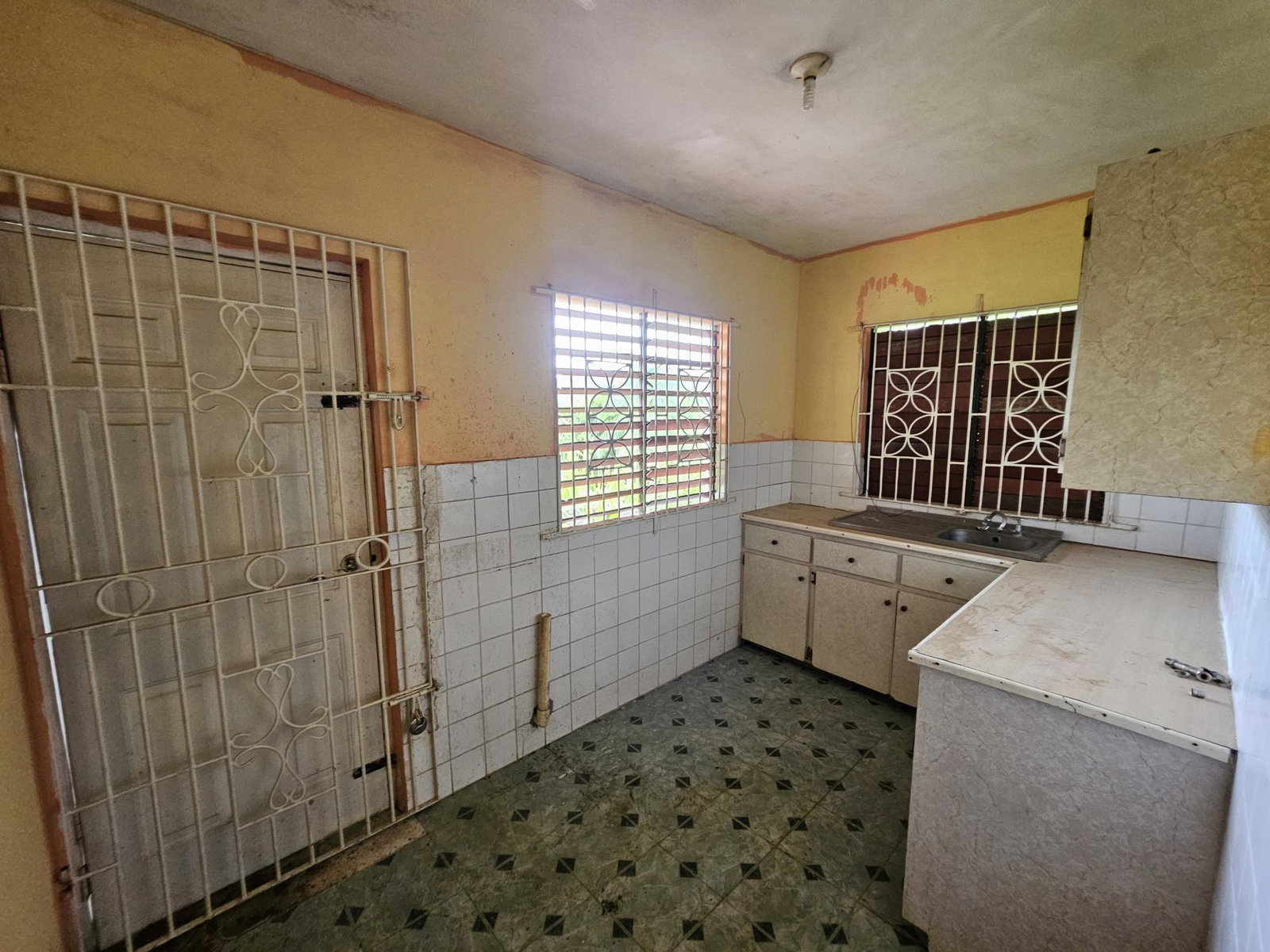 Investment-Opportunity-3-Houses-on-1-Acre-in-Lawrence-Tavern-Jamaica Fifth image of Rose Hall District, Lawre in Lawrence Tavern, St. Andrew, Jamaica - property is For Sale