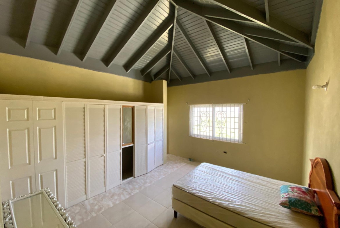 Seventeenth image of 77 Woodpecker Drive, Hellshi in Greater Portmore, St. Catherine, Jamaica - property is For Sale