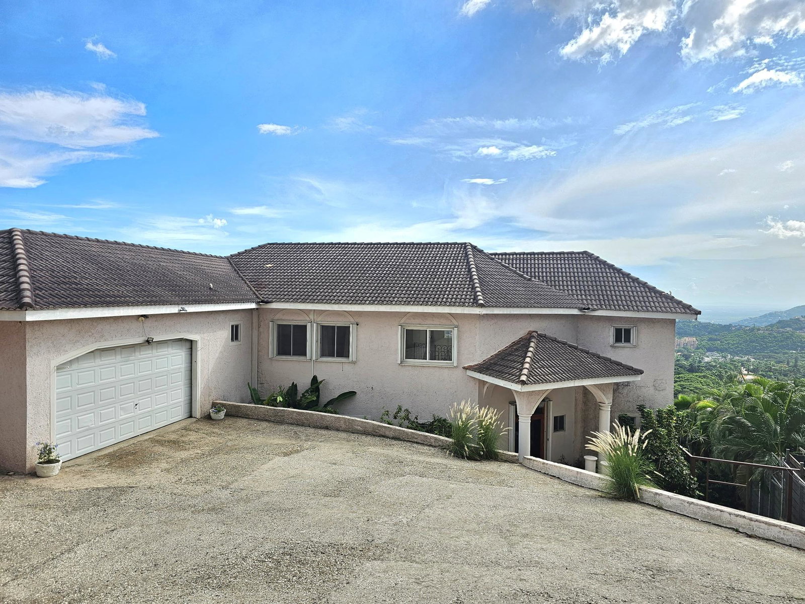 Luxury-Home-for-Sale-in-West-Norbrook-Heights-St.-Andrew First image of 18 West Norbrook Heights dr in Kingston 8, St. Andrew, Jamaica - property is For Sale